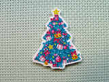 First view of the Christmas Tree Adorned with Gifts Needle Minder