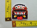 Third view of the Slot Machine Needle Minder