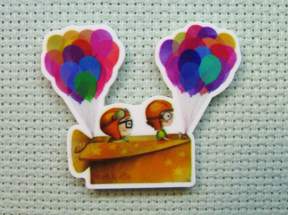 First view of the Young Carl and Ellie in a Box Plane with Balloons Needle Minder