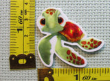 Third view of the Squirt Needle Minder