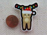 Second view of Christmas Sloth Hanging From a String of Lights Needle Minder.