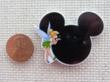 Second view of Tinkerbell Blowing Pixie Dust Across a Black Mickey Head Needle Minder.