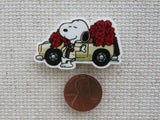 Second view of Snoopy is all dressed up for a Date Needle Minder.