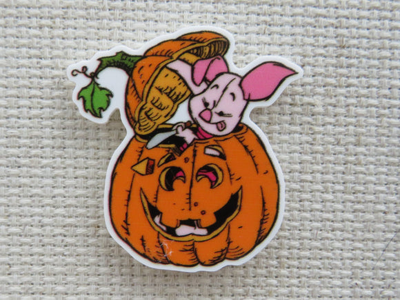 First view of Piglet in a Pumpkin Needle Minder.