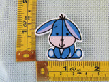 Third view of the Eeyore Needle Minder