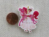 Second view of Mary Poppins with a Pink Carousel Horse Needle Minder.