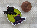 Second view of A Pair of Flying Bats Needle Minder.
