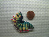 Second view of the Caterpillar Heimlich Needle Minder