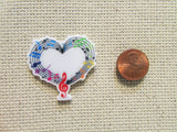 Second view of the Musical Needle Minder