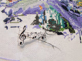 Fifth view of the Musical Needle Minder