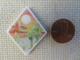 Second view of A Dessert in a Diamond Needle Minder.
