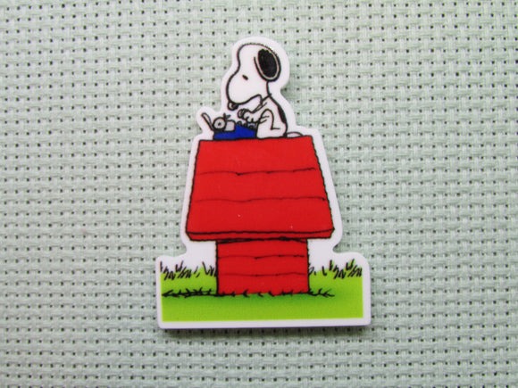 First view of the Snoopy Typing a Letter Needle Minder