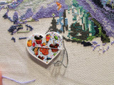 Third view of the Disney Treats in a Heart Needle Minder