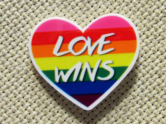 First view of the Love Wins Rainbow Heart Needle Minder