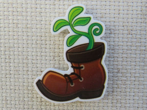 First view of A Plant in a Boot Needle Minder.