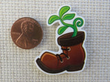 Second view of A Plant in a Boot Needle Minder.