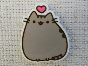 First view of Cartoon Cat with a Heart Needle Minder.