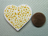 Second view of the Gold Disney Heart Needle Minder