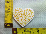 Third view of the Gold Disney Heart Needle Minder