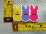 Third view of the Peep Trio Wearing Bow Ties Needle Minder