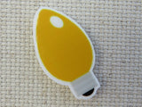 First view of Yellow Christmas Light Needle Minder.