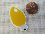 Second view of Yellow Christmas Light Needle Minder.