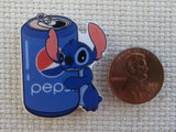 Second view of Stitch Hugging a Pepsi Can Needle Minder,.