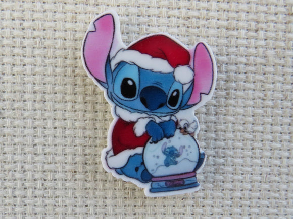 First view of Santa Stitch Watching himself in a Snow Globe Needle Minder.