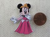 Second view of Minnie  Mouse Dressed as Aurora Needle Minder,.