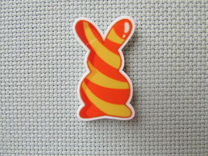 First view of the Yellow and Orange Swirl Bunny Needle Minder