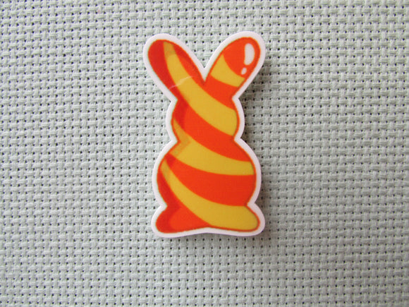 First view of the Yellow and Orange Swirl Bunny Needle Minder