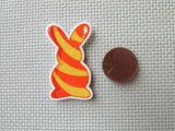 Second view of the Yellow and Orange Swirl Bunny Needle Minder