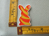 Third view of the Yellow and Orange Swirl Bunny Needle Minder