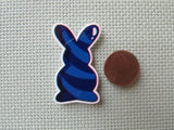 Second view of the Dark Blue Swirl Bunny Needle Minder