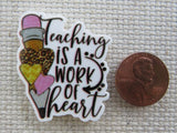 Second view of teaching is a work of heart needle minder.