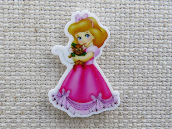 First view of childlike princess holding a mouse needle minder.