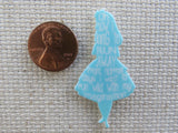 Second view of Alice in blue with words from the story needle minder.