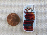 Second view of Waving Owl on a Stack of Books Needle Minder.
