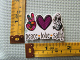 Third view of the Peace Love Sally Needle Minder