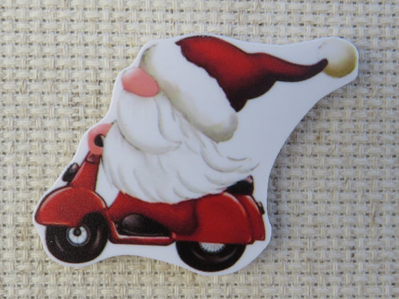 First view of Santa Gnome Riding a Scooter Needle Minder.