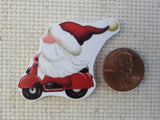 Second view of Santa Gnome Riding a Scooter Needle Minder.