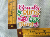 Third view of the Beads & bling it's a Mardi Gras Thing Needle Minder