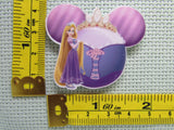 Third view of the Rapunzel in front of a Themed Mouse Head Needle Minder