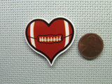 Second view of the Heart Football Needle Minder