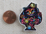 Second view of Cheshire Cat in a Collage of Wonderland Needle Minder.