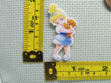 Third view of the Young Cinderella Hugging a Puppy Needle Minder