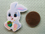 Second view of the Cute Bunny Painting an Easter Egg Needle Minder