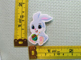 Third view of the Cute Bunny Painting an Easter Egg Needle Minder