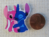 Second view of Stitch and Angel Sharing a Hug Needle Minder,.