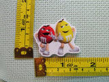 Third view of the Chocolate Candy Red and Yellow Needle Minder